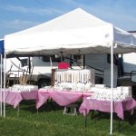 Single pegboard display and necklaces in white jewelry boxes