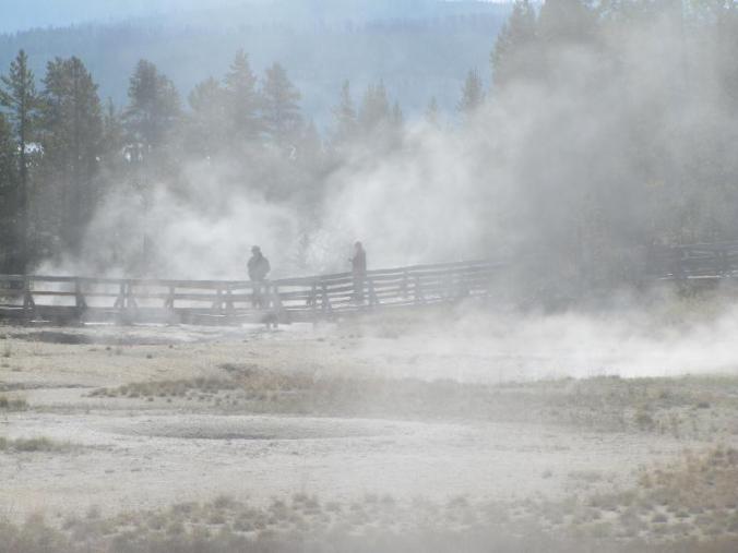 The geysers cover the walkways with steam