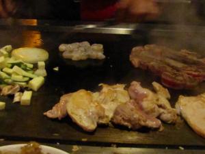 Chicken, steak, shrimp and veggies on the grill at the Kyoto