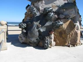 The octopus on the statue base